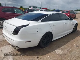 2014 Jaguar XJ R with VIN SAJWA1EK3EMV58692, listed as a IAAI auction lot 42663979 with 111,386 mi miles and . Bid and sale history available at DreamBid. Image 4.