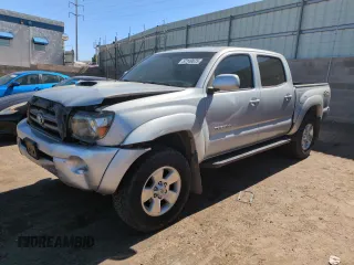 2009 Toyota Tacoma z VIN 3TMLU42NX9M031154, wystawiony jako Copart lot #57149875 z przebiegiem 277 973 mil mil oraz Szkoda całkowita • Salvage title. Historia ofert i sprzedaży dostępna na DreamBid. Obrazek 1.