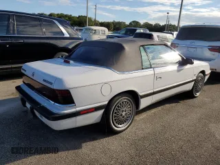 1990 Chrysler LeBaron z VIN 1C3XJ4533LG472070, wystawiony jako Copart lot #74314104 z przebiegiem 97 354 mil mil oraz Szkody całkowita. Historia ofert i sprzedaży dostępna na DreamBid. Obrazek 3.