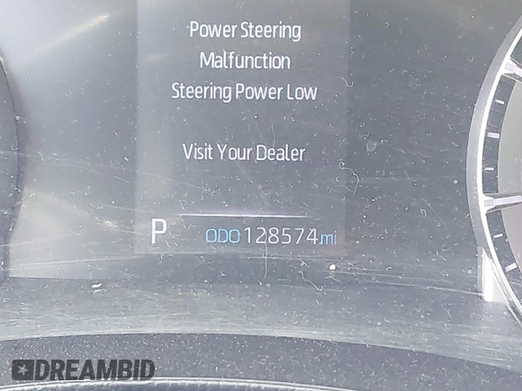 2021 Toyota Highlander L with VIN 5TDZZRAH6MS034453, listed as a IAAI auction lot 41779805 with 128,574 mi miles and . Bid and sale history available at DreamBid. Image 16.