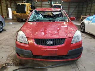 2009 Kia Rio LX with VIN KNADE243696572877, listed as a Copart auction lot 66075394 with 0 mi miles and Non Repairable. Bid and sale history available at carsss.com. Image 5.