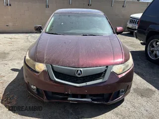 2009 Acura TSX z VIN JH4CU26609C035625, wystawiony jako IAAI lot #42440264 z przebiegiem 115 861 mil mil oraz . Historia ofert i sprzedaży dostępna na DreamBid. Obrazek 12.