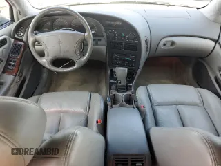 1997 Oldsmobile Aurora with VIN 1G3GR62C0V4102252, listed as a Copart auction lot 53270245 with 123,615 mi miles and Salvage Title. Bid and sale history available at DreamBid. Image 8.