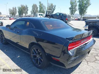 2010 Dodge Challenger SE with VIN 2B3CJ4DV0AH323373, listed as a IAAI auction lot 42081412 with 199,977 mi miles. Bid and sale history available at carsss.com. Image 3.