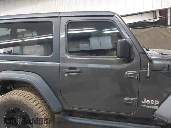 2020 Jeep Wrangler Sport S with VIN 1C4GJXAN4LW229040, listed as a IAAI auction lot 42172180 with 58,701 mi miles and . Bid and sale history available at DreamBid. Image 13.