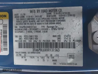 2019 Ford Fusion Hybrid SE with VIN 3FA6P0LUXKR131563, listed as a IAAI auction lot 41448736 with 165,440 mi miles. Bid and sale history available at carsss.com. Image 9.