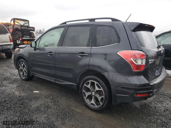 2014 Subaru Forester 2.0XT Premium with VIN JF2SJGDC9EH499538, listed as a Copart auction lot 84694014 with 128,547 mi miles and Salvage Title. Bid and sale history available at carsss.com. Image 2.