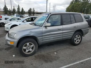 1999 Toyota RAV4 with VIN JT3GP10V0X7054819, listed as a Copart auction lot 44864015 with 140,095 mi miles and Salvage Title. Bid and sale history available at DreamBid. Image 1.