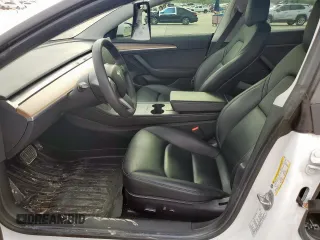 2021 Tesla Model 3 Standard Range Plus z VIN 5YJ3E1EAXMF016770, wystawiony jako Copart lot #55045515 z przebiegiem 38 585 mil mil oraz Szkoda całkowita • Salvage title. Historia ofert i sprzedaży dostępna na DreamBid. Obrazek 7.