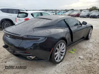 2021 Aston Martin DB11 V8 z VIN SCFRMFAW6MGL10668, wystawiony jako Copart lot #79014154 z przebiegiem Nie podano mil oraz Szkody całkowita. Historia ofert i sprzedaży dostępna na DreamBid. Obrazek 3.