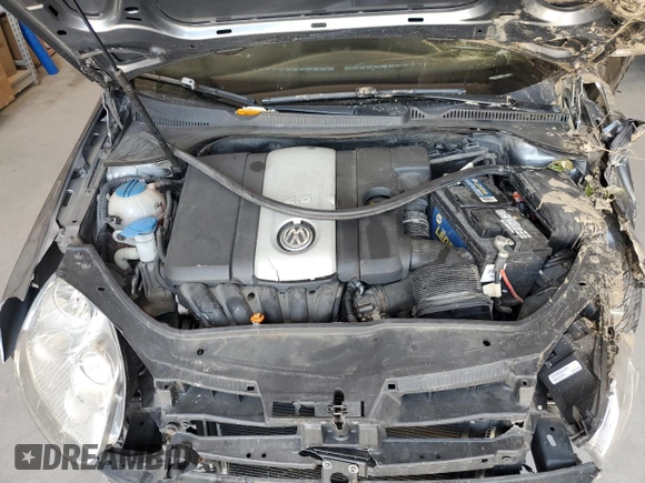 2009 Volkswagen Rabbit S with VIN WVWAB71K29W124868, listed as a Copart auction lot 62224655 with 142,262 mi miles and Salvage title. Bid and sale history available at DreamBid. Image 11.