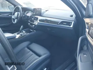 2019 BMW 5 Series 540i xDrive with VIN WBAJE7C54KWW18098, listed as a IAAI auction lot 41412017 with 59,235 mi miles and . Bid and sale history available at carsss.com. Image 5.