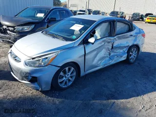 2014 Hyundai Accent GLS with VIN KMHCU4AE3EU603930, listed as a IAAI auction lot 41748640 with 269,813 mi miles. Bid and sale history available at carsss.com. Image 2.