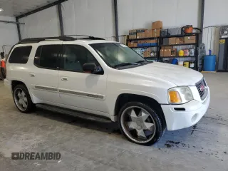 2003 GMC Envoy SLT with VIN 1GKES16S436240107, listed as a Copart auction lot 52327005 with 237,745 mi miles and Clean Title. Bid and sale history available at carsss.com. Image 4.