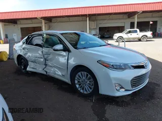 2015 Toyota Avalon Hybrid XLE Touring with VIN 4T1BD1EB8FU044533, listed as a IAAI auction lot 41914580 with 104,739 mi miles. Bid and sale history available at carsss.com. Image 1.