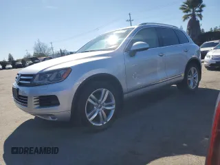 2012 Volkswagen Touareg Lux z VIN WVGEK9BP0CD007411, wystawiony jako Copart lot #46282605 z przebiegiem 132 286 mil mil oraz Szkoda całkowita • Salvage title. Historia ofert i sprzedaży dostępna na DreamBid. Obrazek 1.