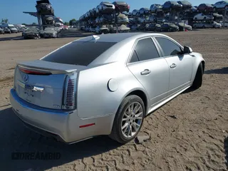 2011 Cadillac CTS Performance with VIN 1G6DJ5ED6B0128062, listed as a IAAI auction lot 42150038 with 245,293 mi miles and . Bid and sale history available at DreamBid. Image 4.