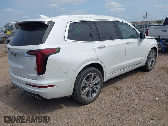 2022 Cadillac XT6 Premium Luxury with VIN 1GYKPCRS2NZ161800, listed as a IAAI auction lot 42174382 with 45,746 mi miles and . Bid and sale history available at DreamBid. Image 4.