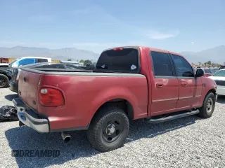 2001 Ford F-150 XLT с VIN 1FTRW07L01KF03457, выставлен на аукционе Copart как лот 60086725 с пробегом 205 917 миль миль и Списание • Salvage title. История ставок и продаж доступна на DreamBid. Изображение 3.