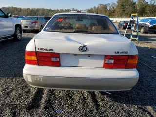2000 Lexus LS 400 z VIN JT8BH28F0Y0175297, wystawiony jako Copart lot #75230834 z przebiegiem 293 851 mil mil oraz Szkoda całkowita • Salvage title. Historia ofert i sprzedaży dostępna na DreamBid. Obrazek 6.