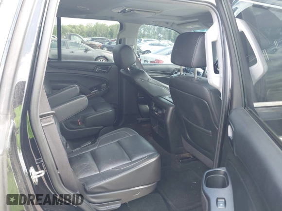 2015 Chevrolet Tahoe LT with VIN 1GNSCBKC1FR615817, listed as a IAAI auction lot 41760474 with 242,148 mi miles and . Bid and sale history available at DreamBid. Image 8.