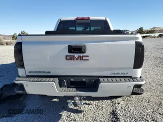 2018 GMC Sierra 1500 Denali z VIN 3GTU2PEJ0JG128872, wystawiony jako Copart lot #42257025 z przebiegiem 110 182 mil mil oraz Szkoda całkowita • Salvage title. Historia ofert i sprzedaży dostępna na DreamBid. Obrazek 6.
