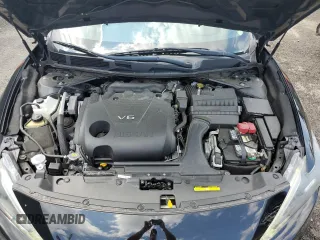 2017 Nissan Maxima SL z VIN 1N4AA6AP3HC452539, wystawiony jako Copart lot #59651495 z przebiegiem 59 437 mil mil oraz Szkoda całkowita • Salvage title. Historia ofert i sprzedaży dostępna na DreamBid. Obrazek 11.