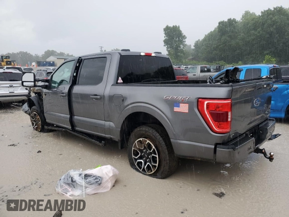 2023 Ford F-150 XL with VIN 1FTFW1E86PFA65505, listed as a Copart auction lot 60644385 with 6,959 mi miles and Salvage title. Bid and sale history available at DreamBid. Image 2.