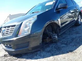 2015 Cadillac SRX Luxury Collection with VIN 3GYFNBE36FS537297, listed as a IAAI auction lot 41733421 with 147,336 mi miles. Bid and sale history available at carsss.com. Image 6.