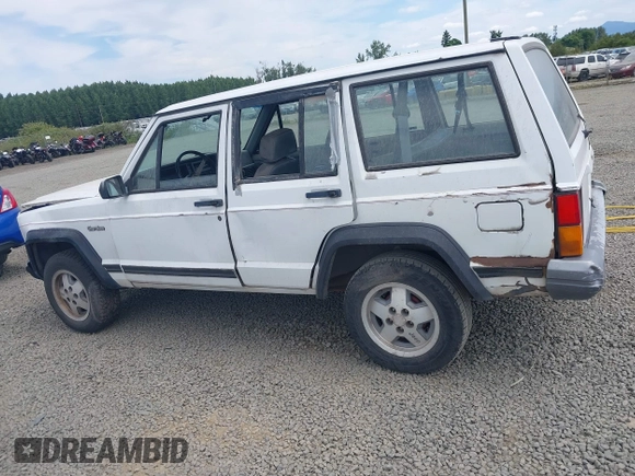1993 Jeep Cherokee z VIN 1J4FT28PXPL560996, wystawiony jako IAAI lot #42526590 z przebiegiem 304 201 mil mil oraz . Historia ofert i sprzedaży dostępna na DreamBid. Obrazek 6.