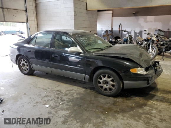 2000 Buick Regal GS with VIN 2G4WF5519Y1126067, listed as a Copart auction lot 70296503 with 216,502 mi miles and Salvage Title. Bid and sale history available at carsss.com. Image 4.