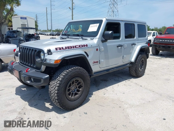 2023 Jeep Wrangler Rubicon with VIN 1C4JJXFG0PW522651, listed as a IAAI auction lot 42112210 with 7,744 mi miles and . Bid and sale history available at DreamBid. Image 18.