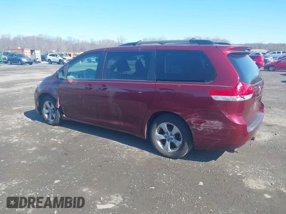 2012 Toyota Sienna LE AAS with VIN 5TDKK3DCXCS244605, listed as a IAAI auction lot 41516400 with 186,198 mi miles. Bid and sale history available at carsss.com. Image 14.