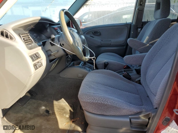 2002 Suzuki Grand Vitara JLX with VIN JS3TD62VX24151115, listed as a Copart auction lot 71155924 with 264,639 mi miles and Salvage Title. Bid and sale history available at carsss.com. Image 7.