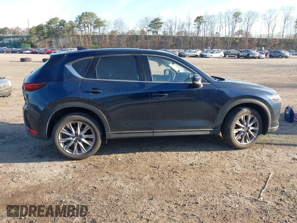 2020 Mazda CX-5 Grand Touring with VIN JM3KFBDM4L0779284, listed as a IAAI auction lot 42060936 with 9,227 mi miles. Bid and sale history available at carsss.com. Image 13.