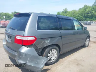 2007 Honda Odyssey LX with VIN 5FNRL38267B029066, listed as a IAAI auction lot 42502433 with 185,721 mi miles and . Bid and sale history available at DreamBid. Image 4.
