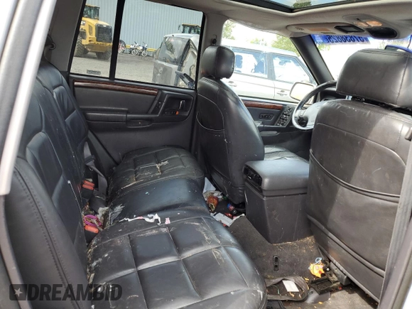 1998 Jeep Grand Cherokee Limited с VIN 1J4GZ78Y0WC245194, выставлен на аукционе Copart как лот 57838825 с пробегом 199 412 миль миль и Списание • Salvage title. История ставок и продаж доступна на DreamBid. Изображение 10.