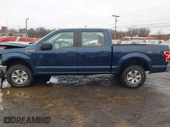 2019 Ford F-150 XL with VIN 1FTEW1EB3KFB10433, listed as a IAAI auction lot 41520139 with 104,405 mi miles and . Bid and sale history available at DreamBid. Image 14.