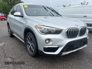 2018 BMW X1 sDrive28i with VIN WBXHU7C38J5L08773, listed as a Copart auction lot 55470955 with 149,885 mi miles and Clean Title. Bid and sale history available at carsss.com. Image 1.
