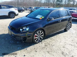 2014 Volkswagen GTI Driver's Edition with VIN WVWHD7AJXEW011230, listed as a IAAI auction lot 41600806 with 124,498 mi miles. Bid and sale history available at carsss.com. Image 2.