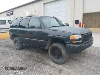 2003 GMC Yukon SLT with VIN 1GKEC13ZX3R181111, listed as a IAAI auction lot 41496338 with 307,996 mi miles. Bid and sale history available at carsss.com. Image 1.
