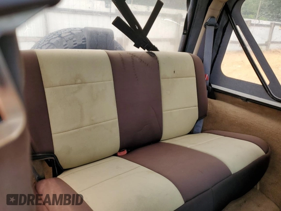 2000 Jeep Wrangler Sahara with VIN 1J4FA59SXYP760278, listed as a Copart auction lot 60402485 with 192,161 mi miles and Salvage title. Bid and sale history available at DreamBid. Image 11.