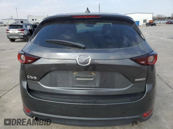 2021 Mazda CX-5 Touring with VIN JM3KFACM9M0330485, listed as a Copart auction lot 44622895 with Not Provided miles and Salvage Title. Bid and sale history available at DreamBid. Image 6.