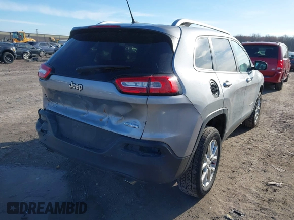 2014 Jeep Cherokee Latitude with VIN 1C4PJMCSXEW125737, listed as a IAAI auction lot 41863778 with 120,226 mi miles. Bid and sale history available at carsss.com. Image 4.