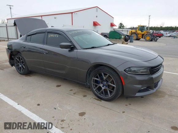 2018 Dodge Charger SXT Plus with VIN 2C3CDXHG0JH217495, listed as a IAAI auction lot 41998783 with 58,247 mi miles and . Bid and sale history available at carsss.com. Image 1.