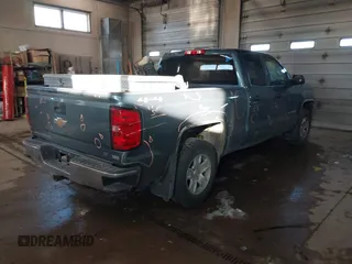 2014 Chevrolet Silverado 1500 LT with VIN 1GCVKREC0EZ130211, listed as a IAAI auction lot 41601900 with 209,604 mi miles and . Bid and sale history available at DreamBid. Image 4.