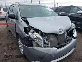 2013 Toyota Sienna XLE with VIN 5TDDK3DC7DS056599, listed as a IAAI auction lot 41736510 with 120,230 mi miles and . Bid and sale history available at DreamBid. Image 1.