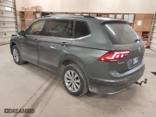 2019 Volkswagen Tiguan S with VIN 3VV0B7AX5KM180611, listed as a IAAI auction lot 41785980 with 169,203 mi miles. Bid and sale history available at carsss.com. Image 3.