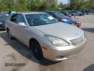 2002 Lexus ES 300 with VIN JTHBF30G525020352, listed as a IAAI auction lot 42122003 with 230,774 mi miles. Bid and sale history available at carsss.com. Image 1.