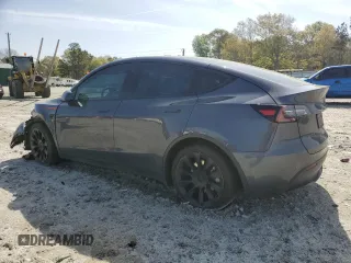 2023 Tesla Model Y Long Range z VIN 7SAYGAEE9PF662103, wystawiony jako Copart lot #51332105 z przebiegiem 35 294 mil mil oraz Szkody całkowita. Historia ofert i sprzedaży dostępna na DreamBid. Obrazek 2.